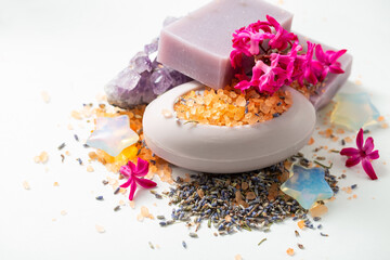 Medicinal bath salt, natural hygienic soap, dried organic lavender, hyacinth flowers and other products for skin care and spa treatments