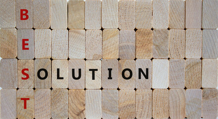 Best solution symbol. Woden blocks with words 'best solution'. Beautiful wooden background. Business and best solution concept. Copy space.