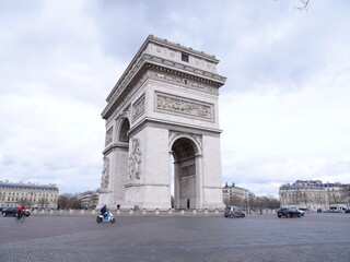 The Arc de Triomphe in Paris during a cloudy day. The Sunday 14th March 2021.