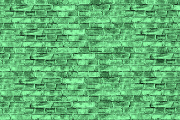 Tinted old brick wall as background.. Abstract green grunge background. Green vintage banner. Copy space.