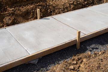 new concrete footpath sidewalk new city work material