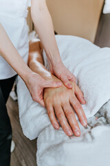 Esthetician or facialist gives a relaxing massage to a man