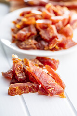 Dried chicken meat. Tasty jerky meat.