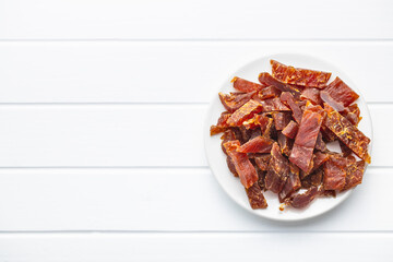 Dried chicken meat. Tasty jerky meat.