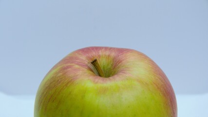 An apple - edible fruit from an apple tree (Malus domestica)