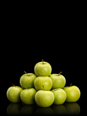 Pyramid from fruits of green apples