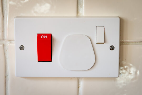 Cooker switch with child proof plug cover