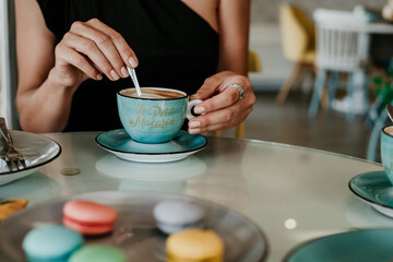 person holding a cup of coffee
