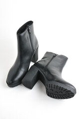 Leather female ankle boots on a white background