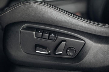 Fototapeta na wymiar Car seats regulation and control with memory mode