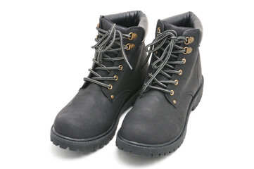 Suede boots with thick soles on a white background