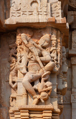Fototapeta na wymiar Ancient bas-relief with dancing Apsara of famous Meera Bai temple in Chittorgarh, Rajasthan, India