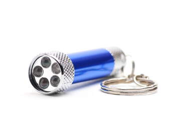 LED flashlight with the ability to recharge from the network on a white background
