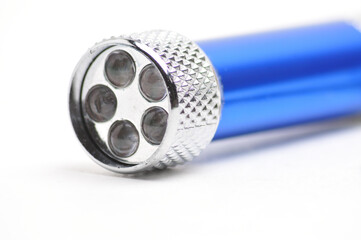 LED flashlight with the ability to recharge from the network on a white background