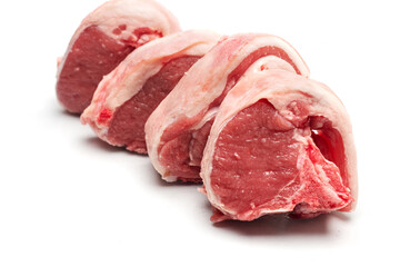 Fresh lamb loin chops on a white isolated background. Meat industry product.