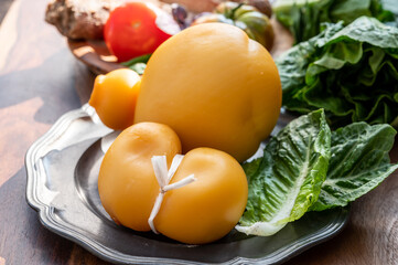 Cheese collection, Italian cheeses provolone, caciocavallo, scamorza made from sheep or cow milk in...