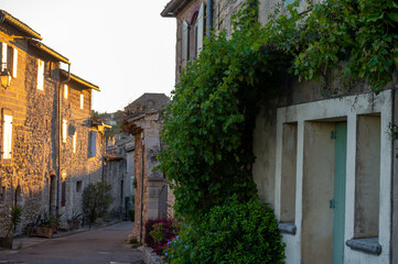 Old buildings and narrow streets in medieval town Villeneuve les Avignon in summer