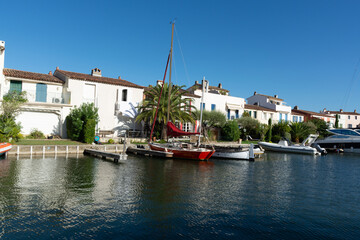 Fototapeta premium Travel and vacation destination, view on houses, roofs, canals and boats in Port Grimaud, Var, Provence, French Riviera, France