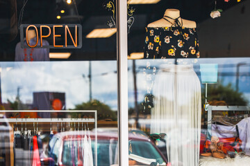 Open Sign On Store Window Display With Mannequin
