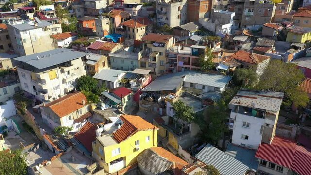 Aerial view of damaged buildings after earthquake.