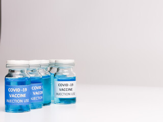 Selective focus COVID 19 VACCINE isolated on white background.  