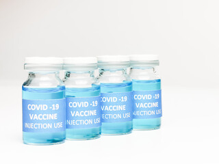 Selective focus COVID 19 VACCINE isolated on white background.  