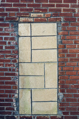 Wall with three different styles of bricks
