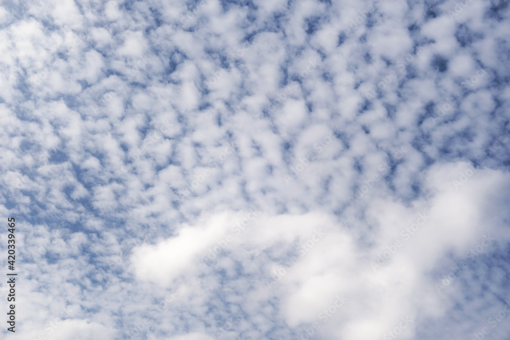 Wall mural blue sky with beautiful white clouds with different shapes