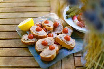 Breakfast on the table in the yard in the summertime