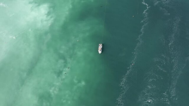Commercial boat fishing for herring during annual herring spawn