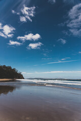  Kingston beach in southern Hobart in Tasmania, Australia on a sunny windy day with intense swell and waves and no people