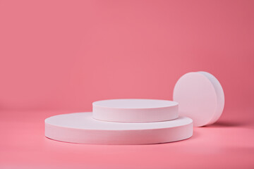 Cosmetic background for product presentation. The pink stone podium on pink background