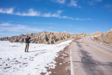 A photographer in the Badlands National Park, South Dakota, U. S. A.