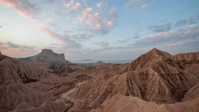 Sunrise timelapse over a Utah-looking landscape in Spain.