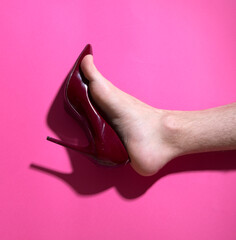 Man wearing woman shoes. Man legs. Shoes. 