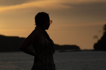 silhouette of a person in the sunset