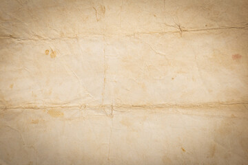 Recycled crumpled brown paper texture or paper background for design with copy space for text or image