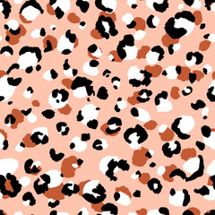 Abstract modern leopard seamless pattern. Animals trendy background. Beige and black decorative vector stock illustration for print, card, postcard, fabric, textile. Modern ornament of stylized skin.