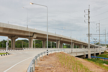 Elevated Way or Highway and Road and Street Light Pole on Sky Background