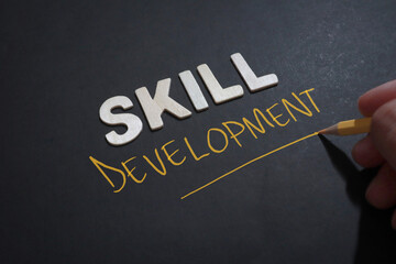 Skill Development, text words typography written on wooden lettering, life and business motivational inspirational