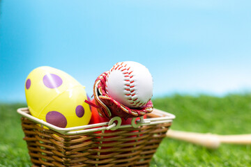 Baseball with Easter Eggs in the basket  for Easter Holiday 