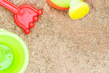 colorful plastic toys for the beach on sand