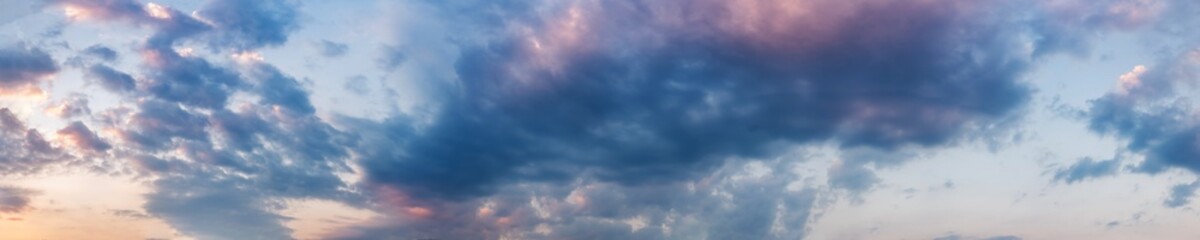 Obraz premium Dramatic panorama sky with storm cloud on a cloudy day. Panoramic image.