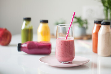 Plastic bottles with fruit and vegetable juices. The concept of the detox program, smoothies.