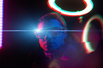 Cyberpunk style portrait of man in futuristic costume. Image with glitch effect.