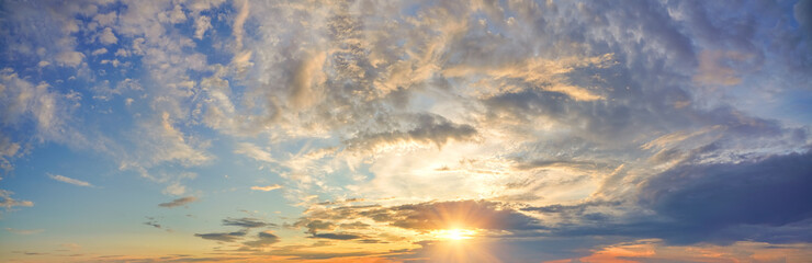 Fototapeta na wymiar Panorama of dramatic colorful sky at sunset
