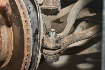 Zoom View Outer Tie Rod End and Disk Brake on Wheel Hub and Front CV Axle Drive Shaft