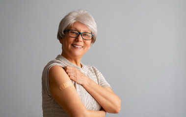 Senior woman after vaccination. - Powered by Adobe