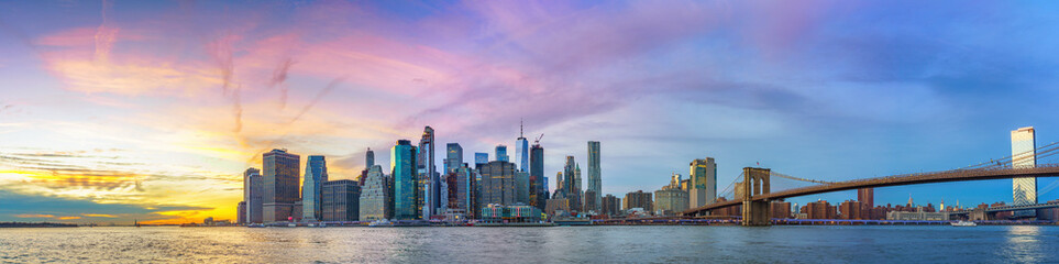 Panoramic view on Manhattan and Brooklyn bridge at sunset, New York City