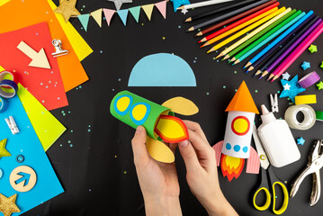 Step-by-step instruction crafts with children from rolls of toilet paper on the theme of space and rocket. Step 4.